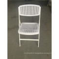 Chaise pliante en plastique de couleur blanche